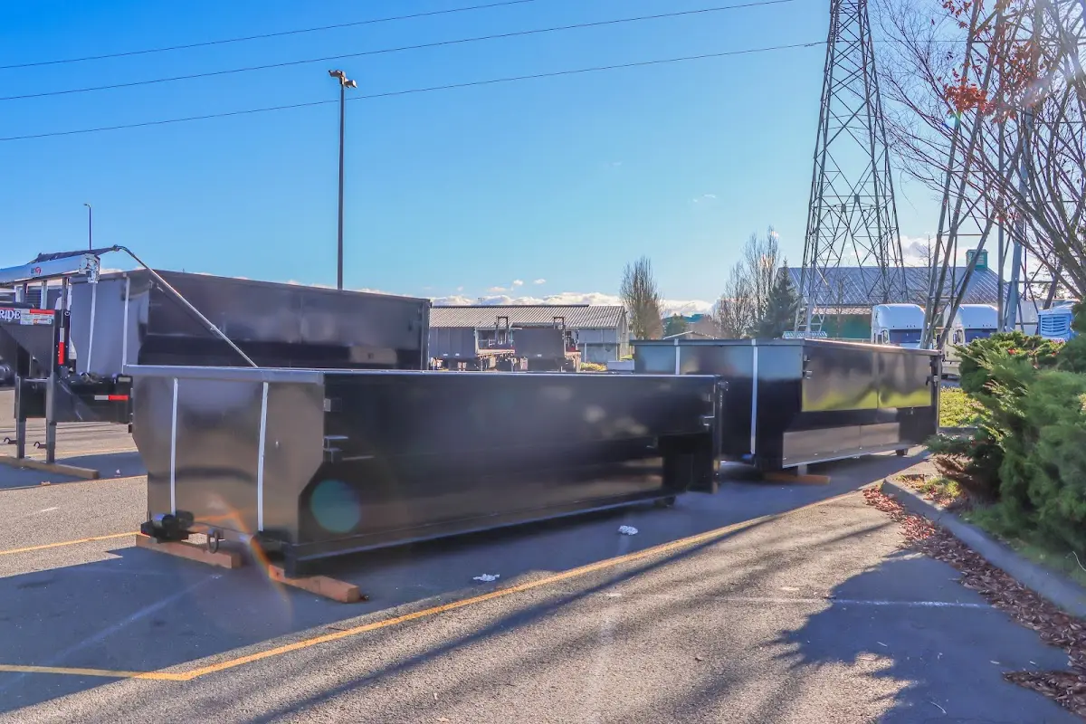 Roll-off dumpster ready for waste disposal at job site for Yard Waste Dumpster Rental in Florence